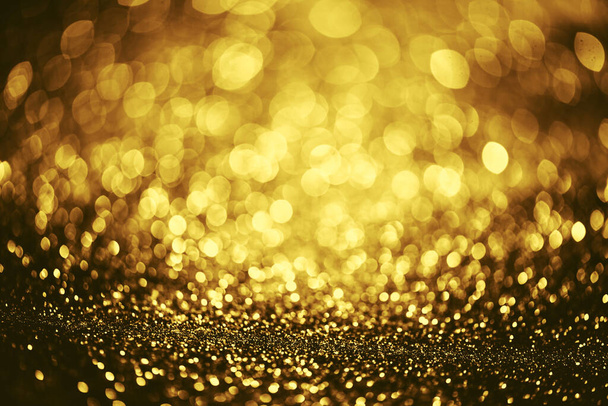 Золотий блиск текстури боке освітлення Розмитий абстрактний фон на день народження, ювілей, весілля, переддень Нового року або Різдво
 - Фото, зображення