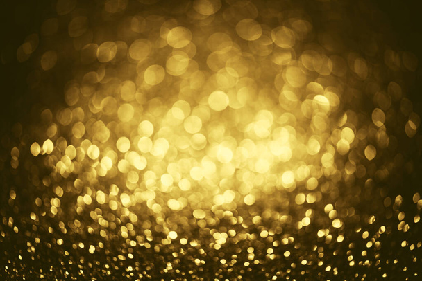 kultainen glitter bokeh valaistus rakenne Hämärtynyt abstrakti tausta syntymäpäivä, vuosipäivä, häät, uudenvuodenaattona tai jouluna
 - Valokuva, kuva