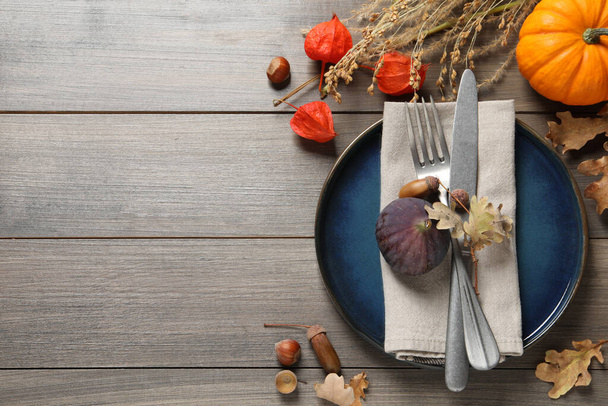 Autumn table setting on wooden background, flat lay. Space for text - Valokuva, kuva
