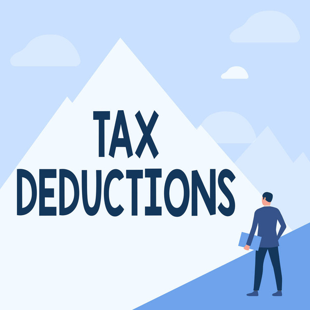 Text sign showing Tax Deductions. Business overview an amount or cost that subtracted from someone s is income Gentleman In Suit Standing Holding Notebook Facing Tall Mountain Range. - Photo, Image