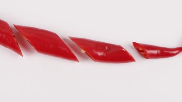 Vörös chilis paprika. Mozgatás. Első látásra. Forgás 360. 4K UHD videó felvétel 3840X2160 - Felvétel, videó