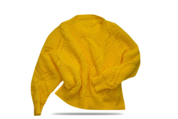 白い背景に隔離された黄色の女性のセーター - 写真・画像