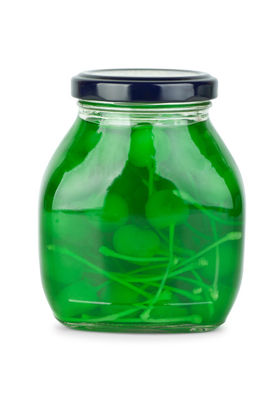 Glass jar with green cocktail cherries - Photo, Image