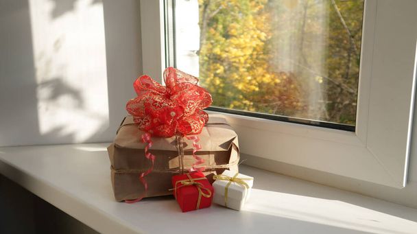 close up of gift boxes  in the room on windowsill - Photo, image