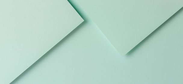 Minimale geometrische Formen und Linien in hellgrüner Farbe. Abstrakt monochrom kreativ Papier Textur Banner Hintergrund - Foto, Bild