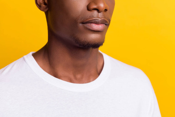 Cropped photo of young dark skin man chin skin care bristle unshaven isolated on shine yellow color background - Foto, Imagem