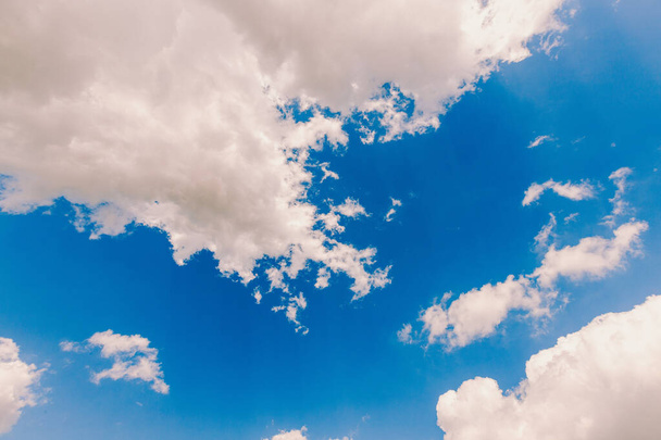 Blue sky with white clouds on a sunny day - Zdjęcie, obraz