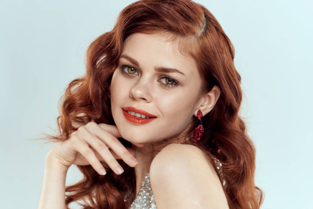 attractive woman redhead posing cosmetics glamor blue background - Фото, зображення