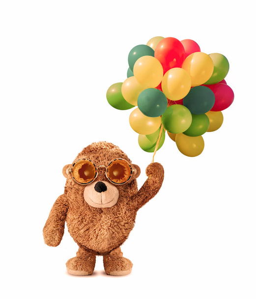 Happy plush bear having fun with colorful balloons. Plush bear character reinterpreted with photo manipulation. Cute plush bear. Valentine's Day. 3D illustration. Plush bear character design. White ba - Foto, Bild
