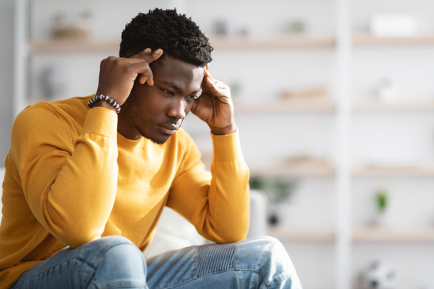 Black guy touching his head, suffering from migraine - Photo, Image