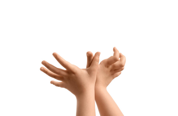 Child performing a shadow play on white background - Photo, Image