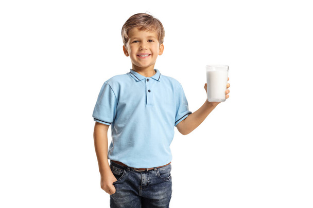 Cute little boy holding a glass of milk isolated on white background - Foto, Imagem