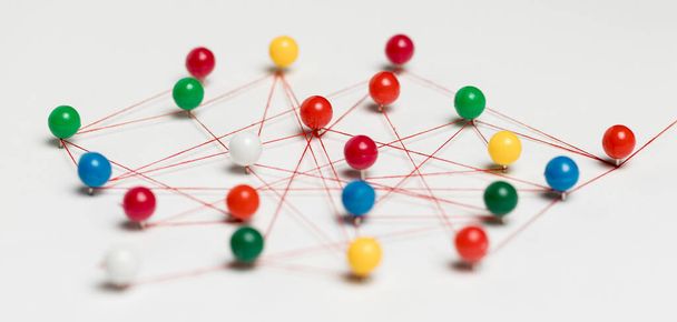 colourful pushpins with thread route map. High quality photo - Foto, Bild