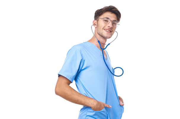 male doctor health care treatment stethoscope examination studio lifestyle - Фото, изображение