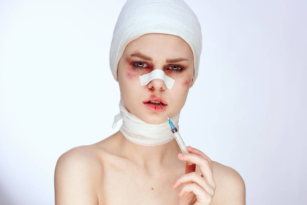 female patient bruised face medicine treatment injury isolated background - Foto, Imagen