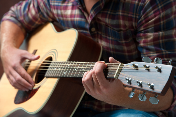 musician playing acoustic guitar - Fotó, kép