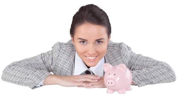 young woman with a piggy bank - Foto, imagen