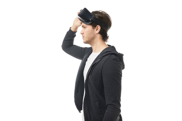 Man taking off VR headset - Foto, Imagen
