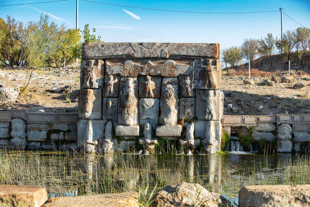 The Hittite spring sanctuary of Eflatun Pinar lies about 100 kilometres west of Konya close to the lake of Beysehir in a hilly, quite arid landscape. - Photo, Image