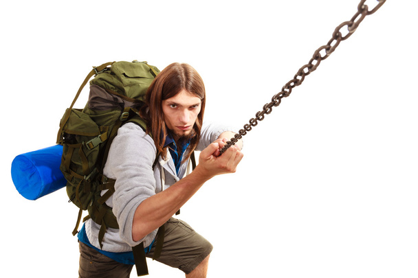 male hiker with backpack climbing isolated - Foto, afbeelding