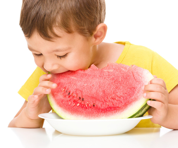 Little boy is eating watermelon - Zdjęcie, obraz
