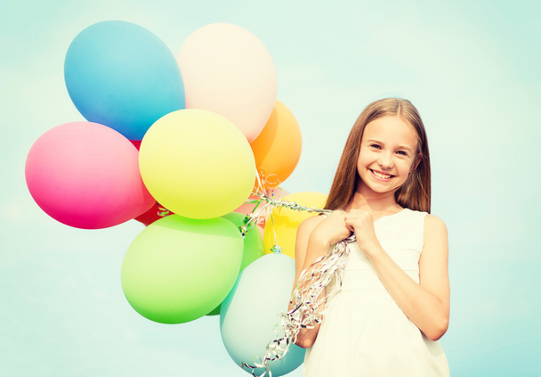 happy girl with colorful balloons - Фото, зображення