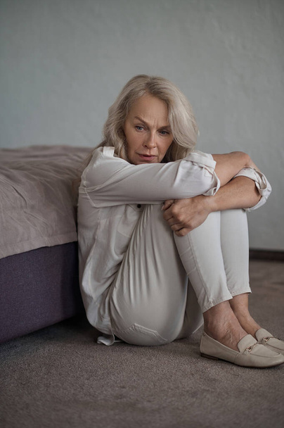Dispirited mature Caucasian woman suffering from depression - Foto, Imagem