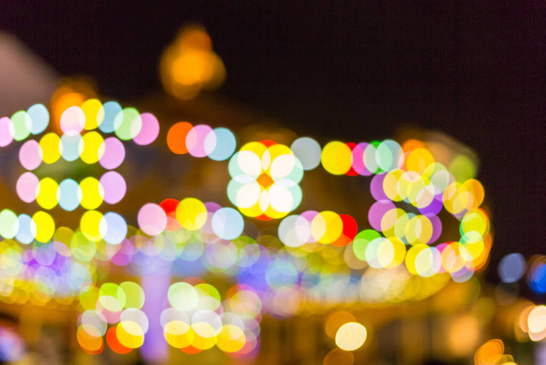 elmosódott fény a karnevál fesztivál éjszakai piaci háttér - Fotó, kép