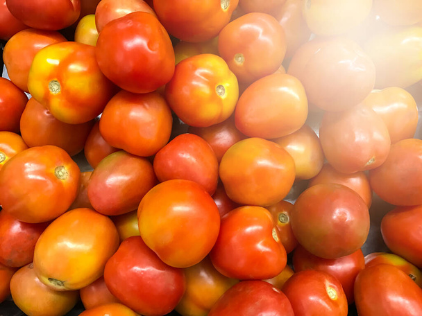 Fresh Tomatoes on the market background - Фото, изображение