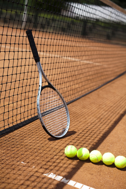 Tennis pallot makaa rivissä
 - Valokuva, kuva