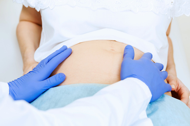 Pregnant woman examined at hospital - Photo, image