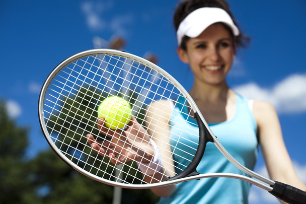 Woman playing tennis - Фото, зображення
