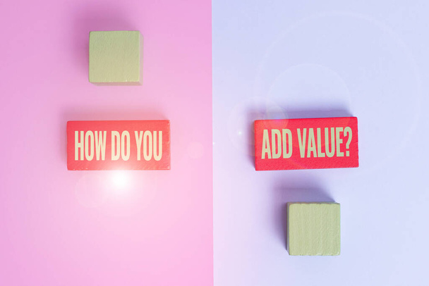Sign displaying How Do You Add Value Question. Business showcase improve work undertaking production process Two Objects Arranged Facing Inward Outward On a Separated Coloured Background - Photo, Image