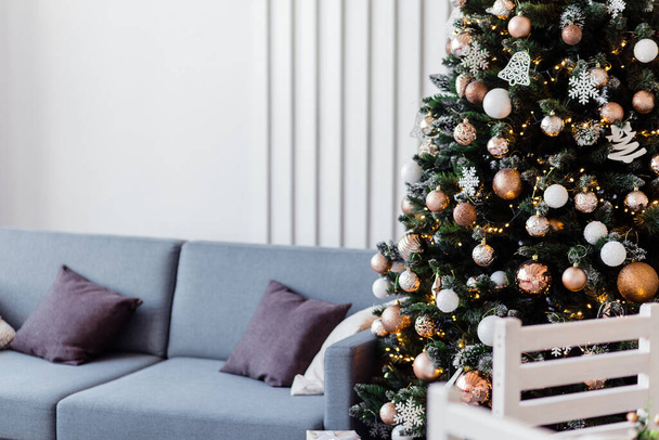 Cozy living room in Scandinavian style decorated with New Year decor. Photo - Φωτογραφία, εικόνα