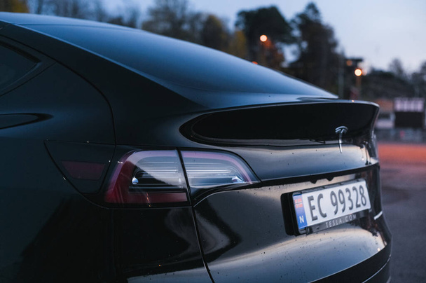 Tonsberg, Norway - October 27, 2021: black Tesla model Y Long Range Dual motor is an electric car  - 写真・画像