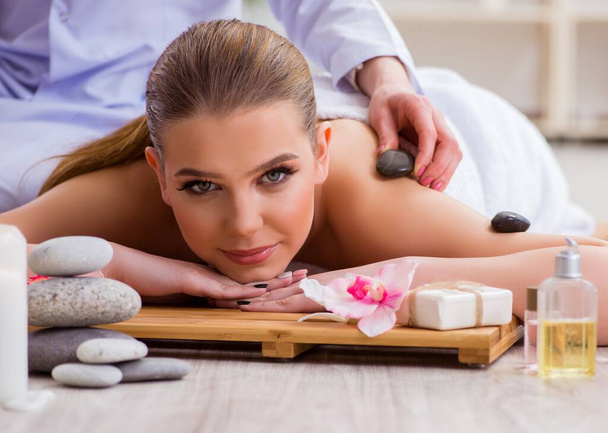 Young woman during spa procedure in salon - Photo, Image