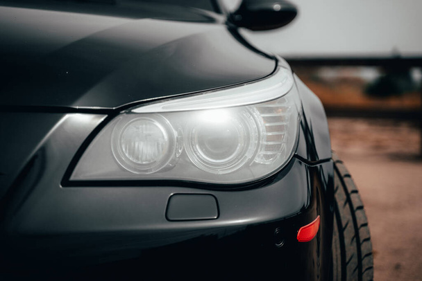 A closeup shot of a black car - Φωτογραφία, εικόνα