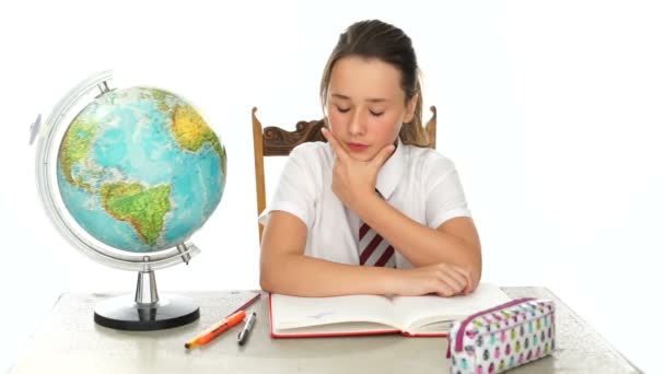 Young girl learning geography at school - Footage, Video