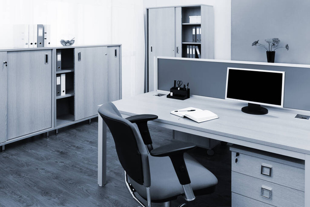 monitor on a desk in a modern office - Foto, Bild