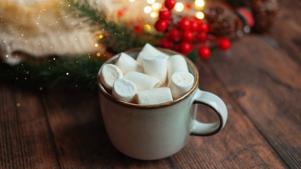 coffee with marshmallows in a cup on the background of a Christmas decor , the concept of Christmas - Photo, Image