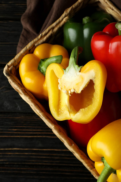Concept of tasty food with bell pepper on wooden background - Fotoğraf, Görsel