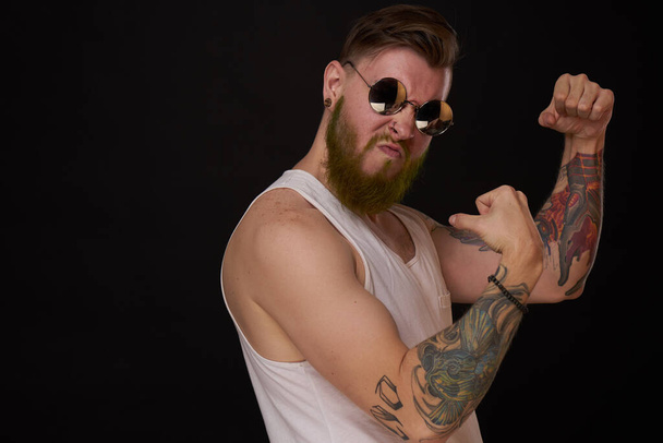 bearded macho man in white t-shirt sunglasses fashion tattoos - Фото, изображение
