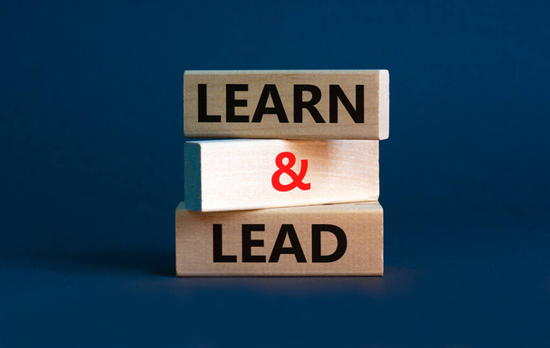 Learn and lead symbol. Concept words 'Learn and lead'. Beautiful grey background. Business, educational and learn and lead concept, copy space. - Fotó, kép