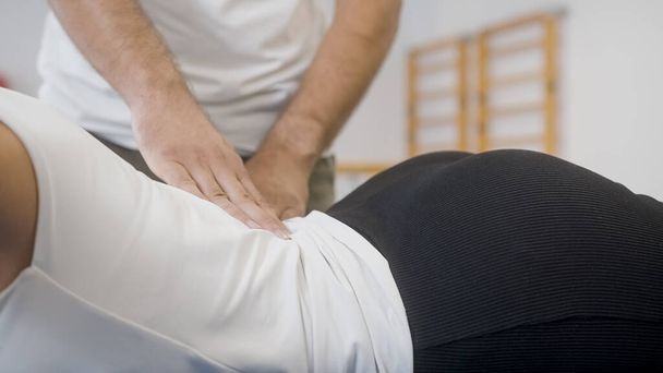 Medical back massage during a rehabilitation - Photo, image
