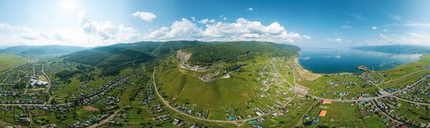 The Baikal serpentine road - aerial view of natural mountain valley with serpantine road, Trans-Siberian Highway, Russia, Kultuk, Slyudyanka. Panoramic view. - Photo, Image