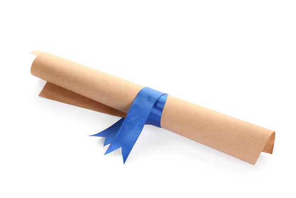 Rolled student's diploma with blue ribbon on white background - Foto, immagini