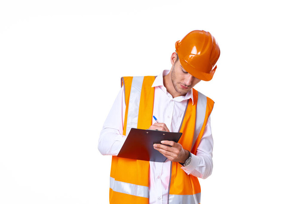 man in orange hard hat engineer work professionals construction - Fotó, kép