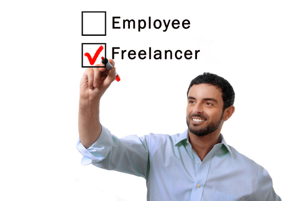 businessman choosing freelancer to employee at formular ticking box with red marker - Photo, Image