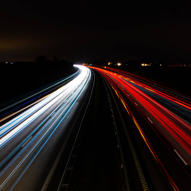 A highway with white and red illuminations at n - Fotoğraf, Görsel