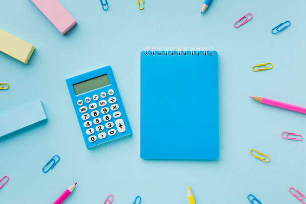 blank notepad calculator top view. High quality photo - Foto, imagen
